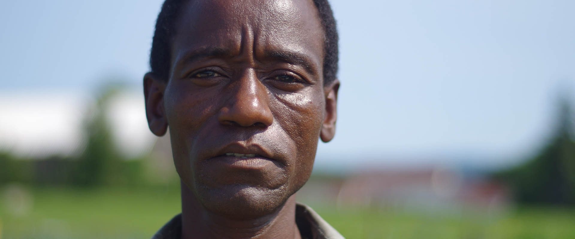 A Somali Bantu man out in the fields